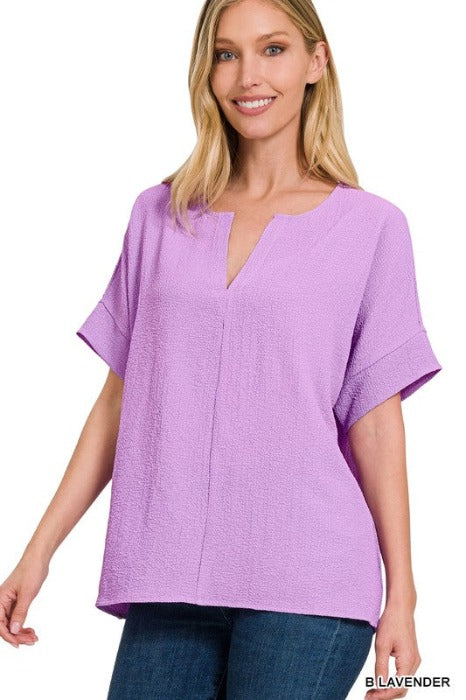 WOVEN BUBBLE AIRFLOW SPLIT NECK TOP
